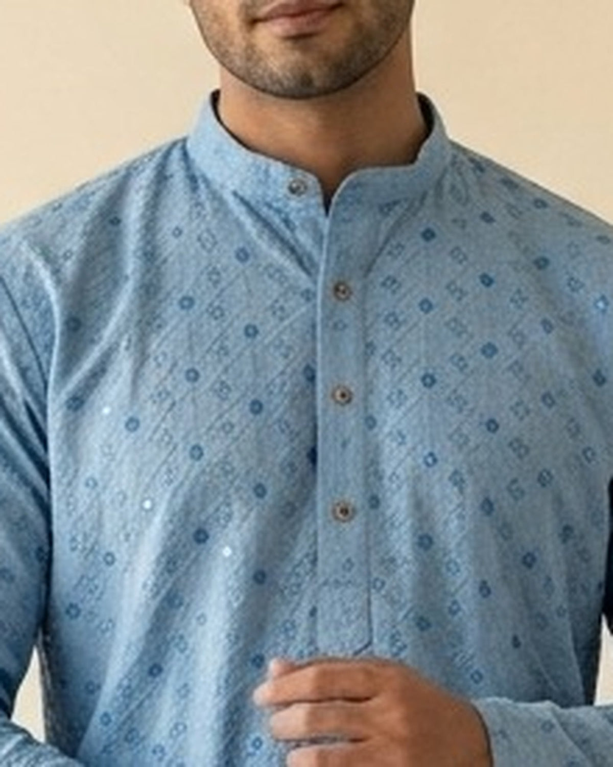 Sky blue chikankari-style kurta for men, collar and placket close-up