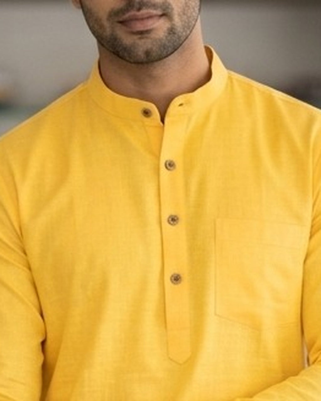 Bright yellow kurta for men, collar and placket close-up
