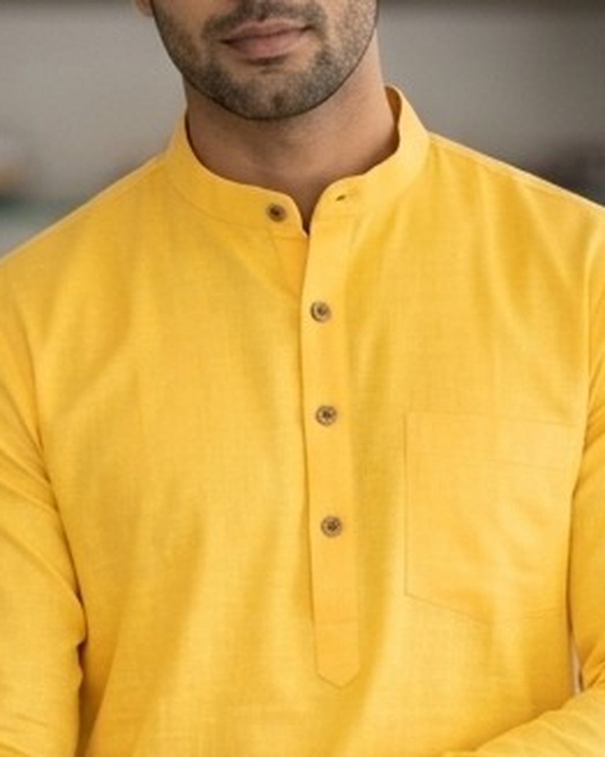 Bright yellow kurta for men, collar and placket close-up